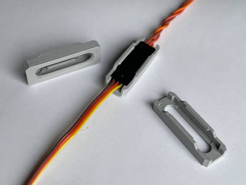 Servo connector security clip
