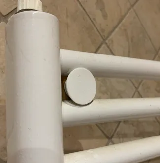 Radiator holder with cap
