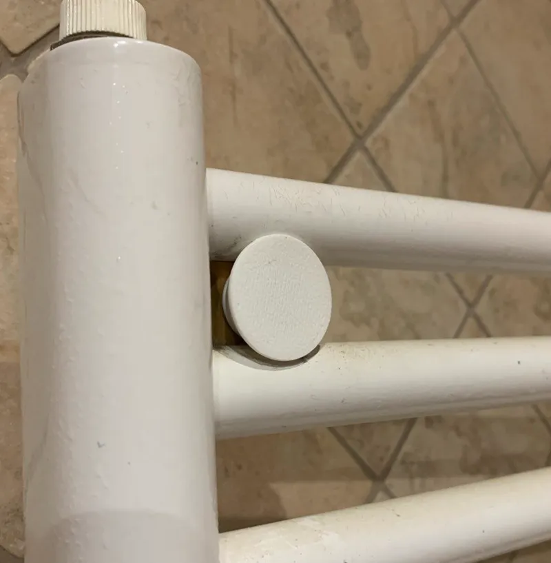Radiator holder with cap