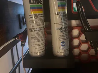 Grease tube holder for HSW