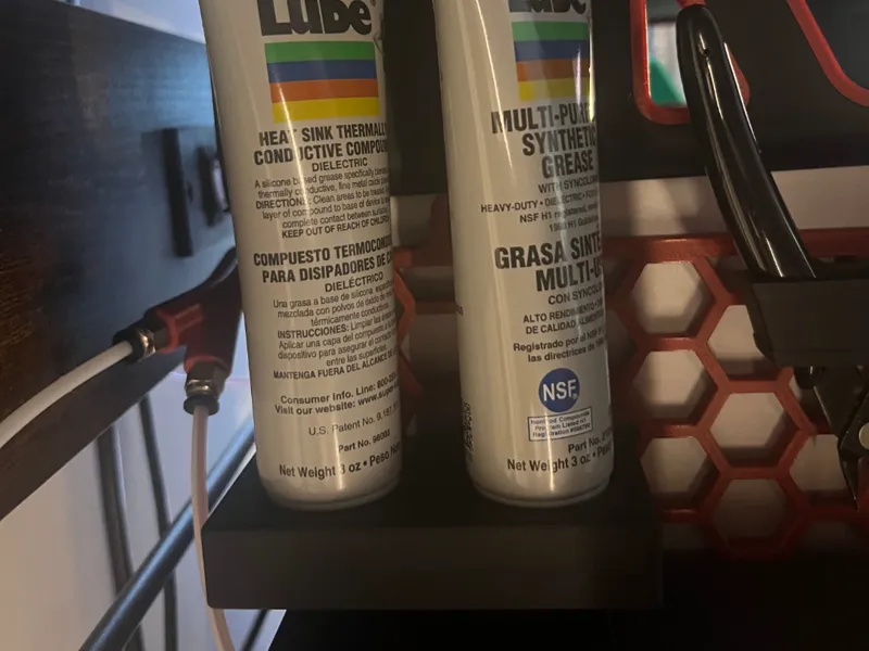 Grease tube holder for HSW