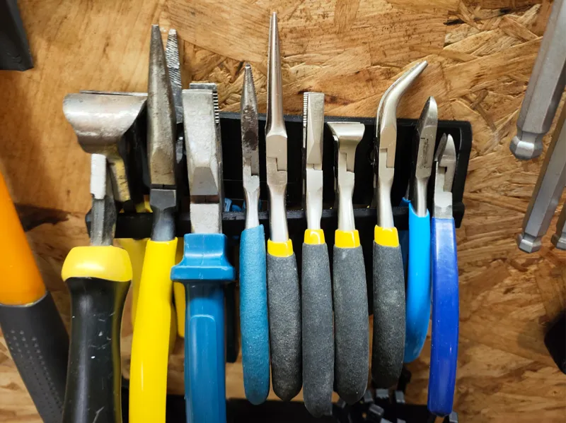 Asymmetric Pliers Holder