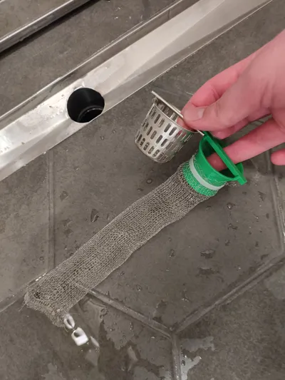 Shower drain lint filter holder