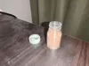 A1, three bottles on one plate, Transparent PLA, with slightly reduced transparency only at the bottle bottom, balancing both effect and efficiency