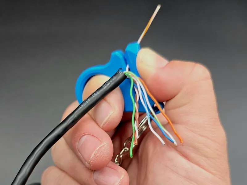 Keychain Thumb Saver - Straightener for CAT Cable
