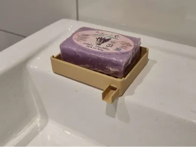 Soap dish with self draining