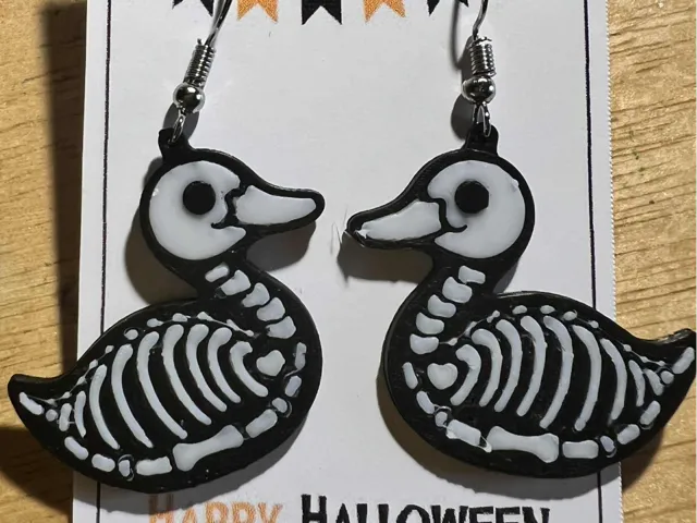 skeleton duck earrings