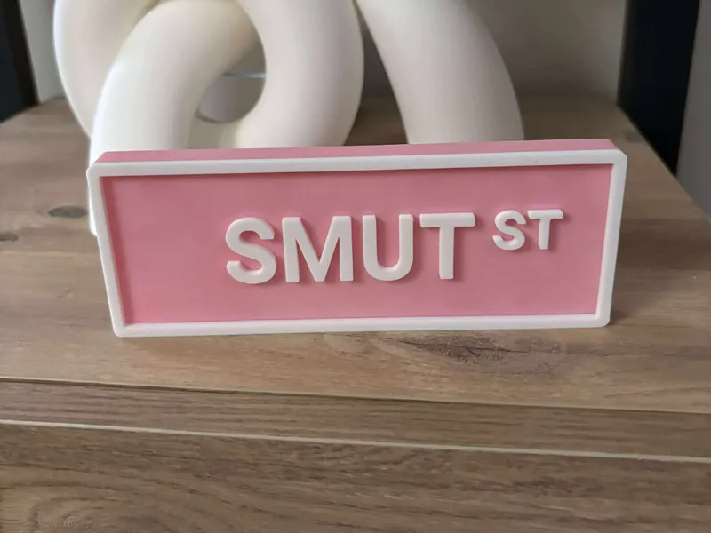 Smut St Book Shelf Street Sign
