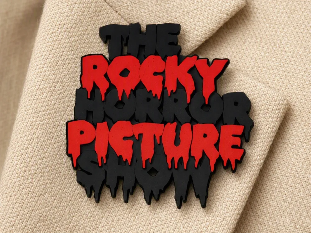 Clip o pieza de sujeción: Rocky Horror Picture Show Ohrringe und Brosche. Referencia del modelo original.