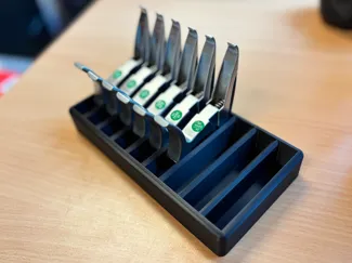 Storage rack for 9 guitar capos