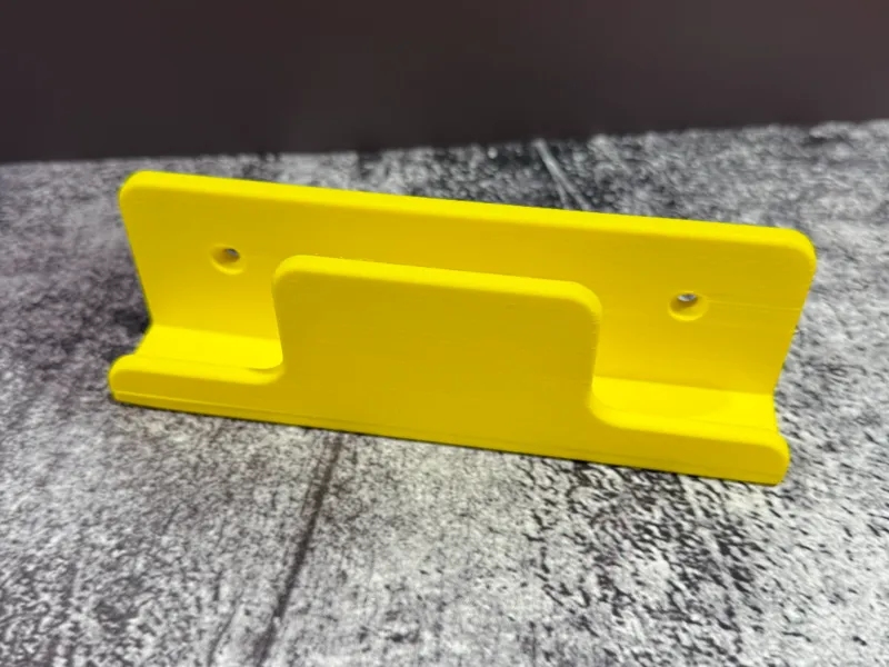 Table saw push block wall holder