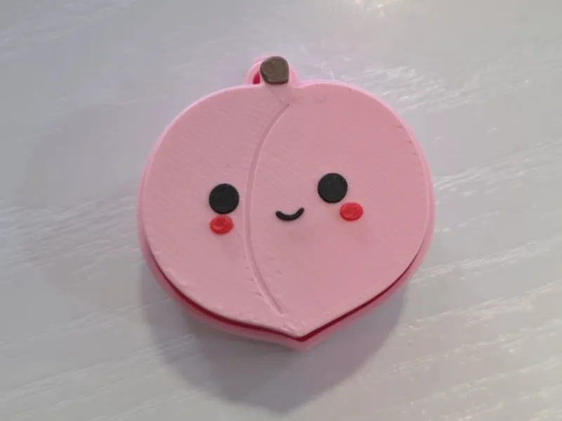Cute peach  clicker fidget toy