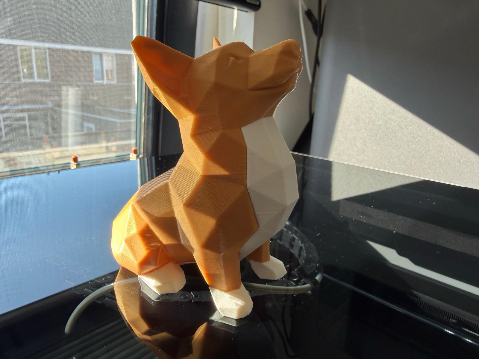 Miniatura 1 do modelo 3D Sitting corgi low poly