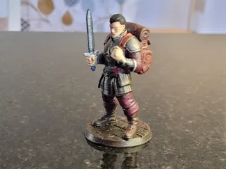 Male model adventurer on round base