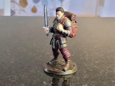 Male model adventurer on round base