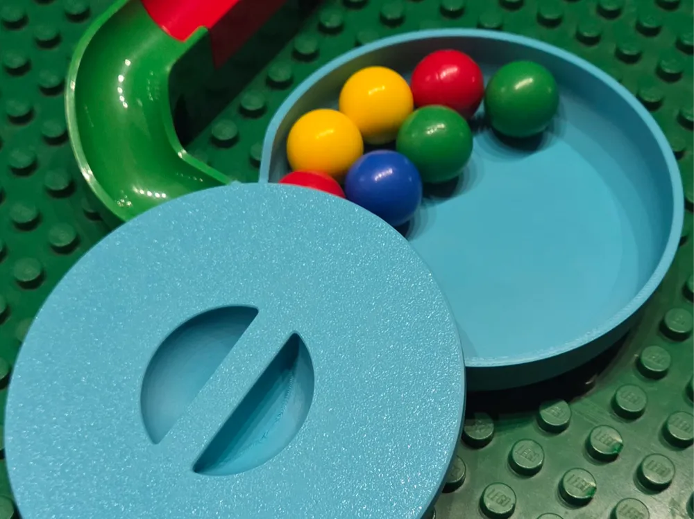 Organizador: Hubelino Marble Run Catch Bowl with Storage Lid. Referencia del modelo original.