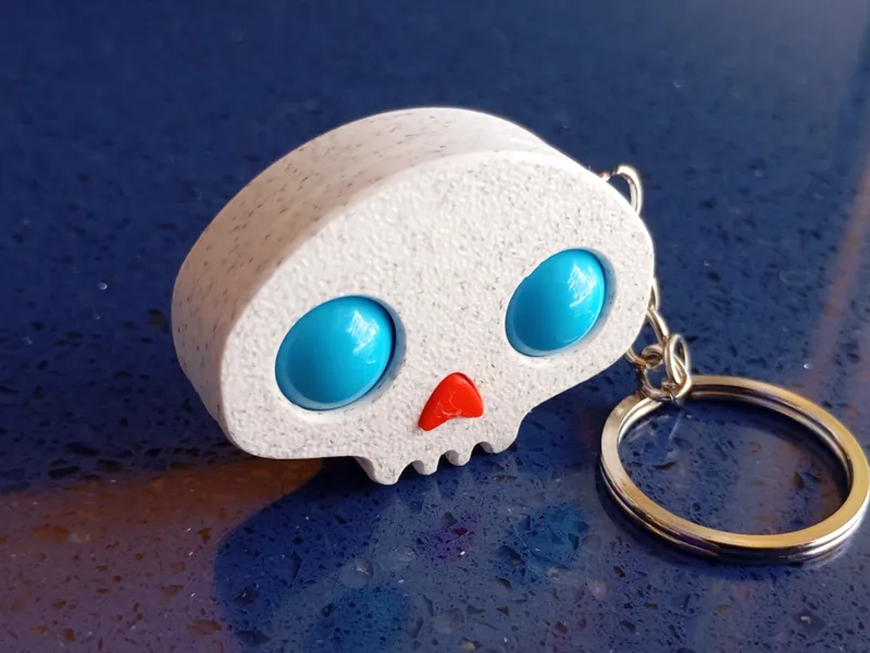 kawaii skull fidget marble toy keychain