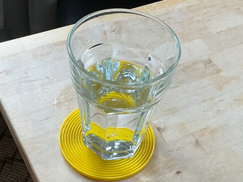 Coaster with circular drip tray