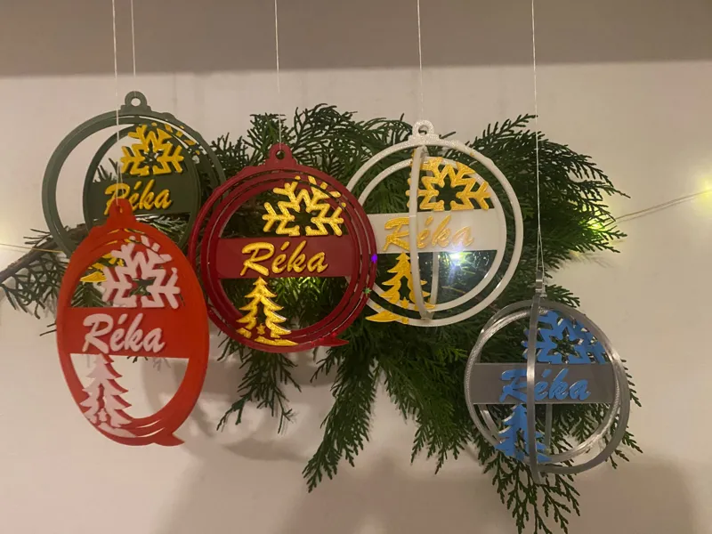 Personalized rotating name tags for Christmas tree