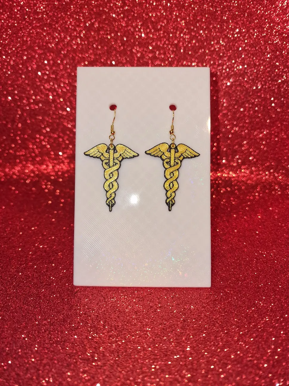 Caduceo earrings view 2