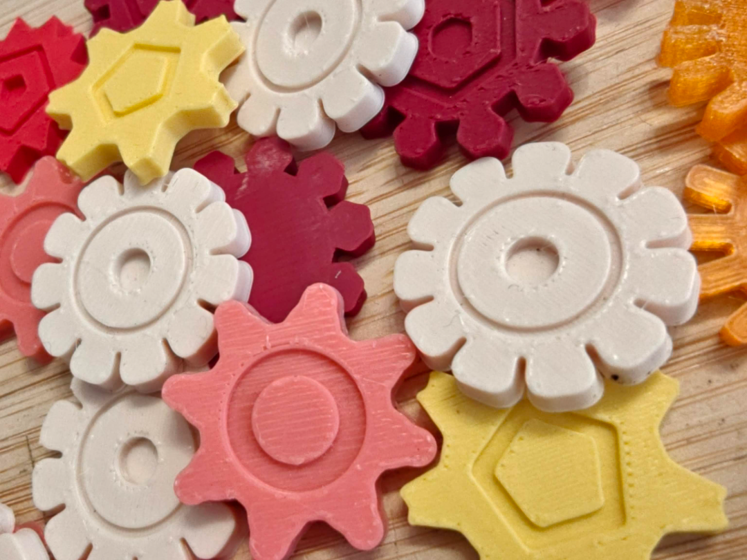 10 different flower tokens / coins