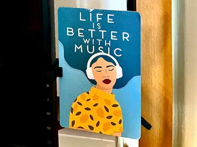 Postcard holder for your monitor. Only 2.5 g.
