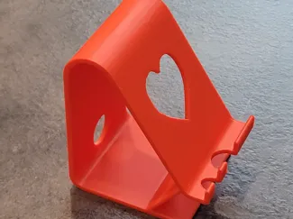Supporto telefono con cuori e fori ricarica
