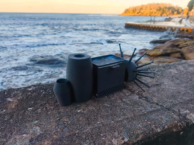 Aquatic trash container