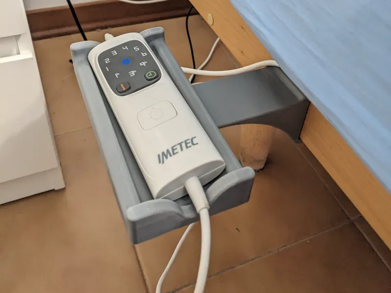 Imetec remote control holder