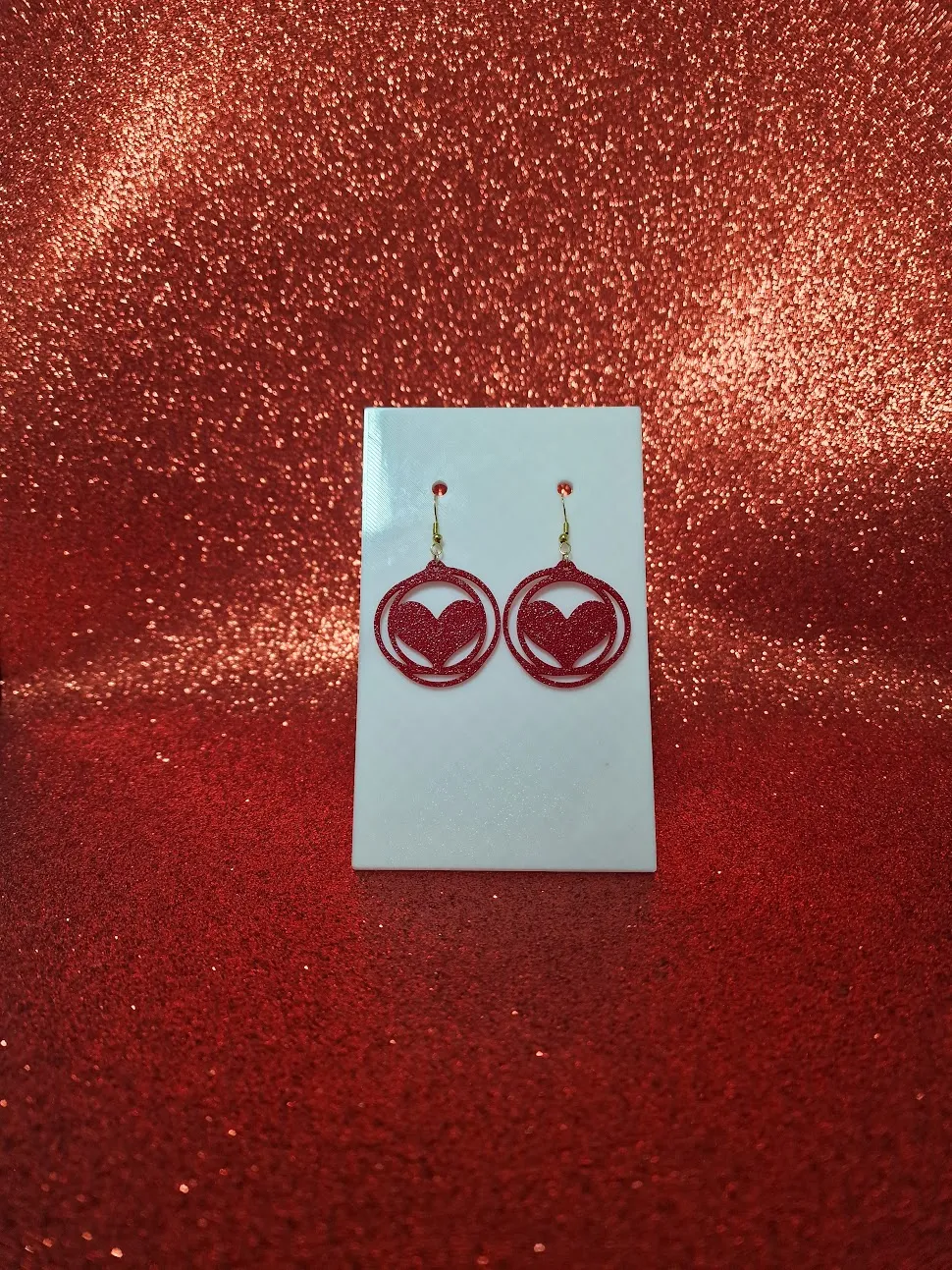 Interwoven heart earrings view 2