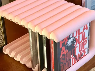 Puff puff tubular CD rack