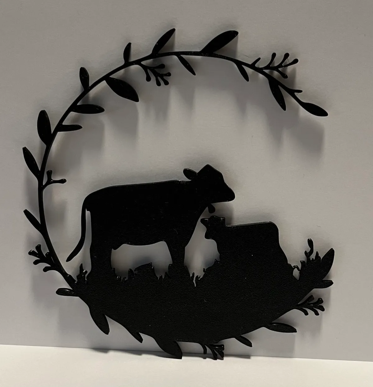 Décoration murale vache dans un pré