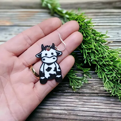 Sitting cow earrings