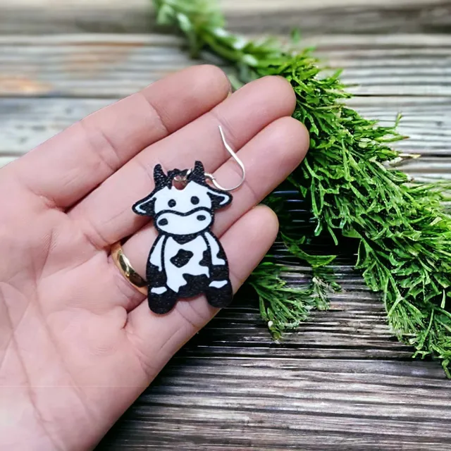 Sitting cow earrings