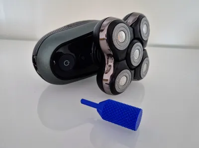 Tool for Remington head shaver blades cleaning