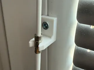 Window blind wand holder