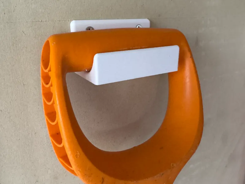 Shovel wall holder