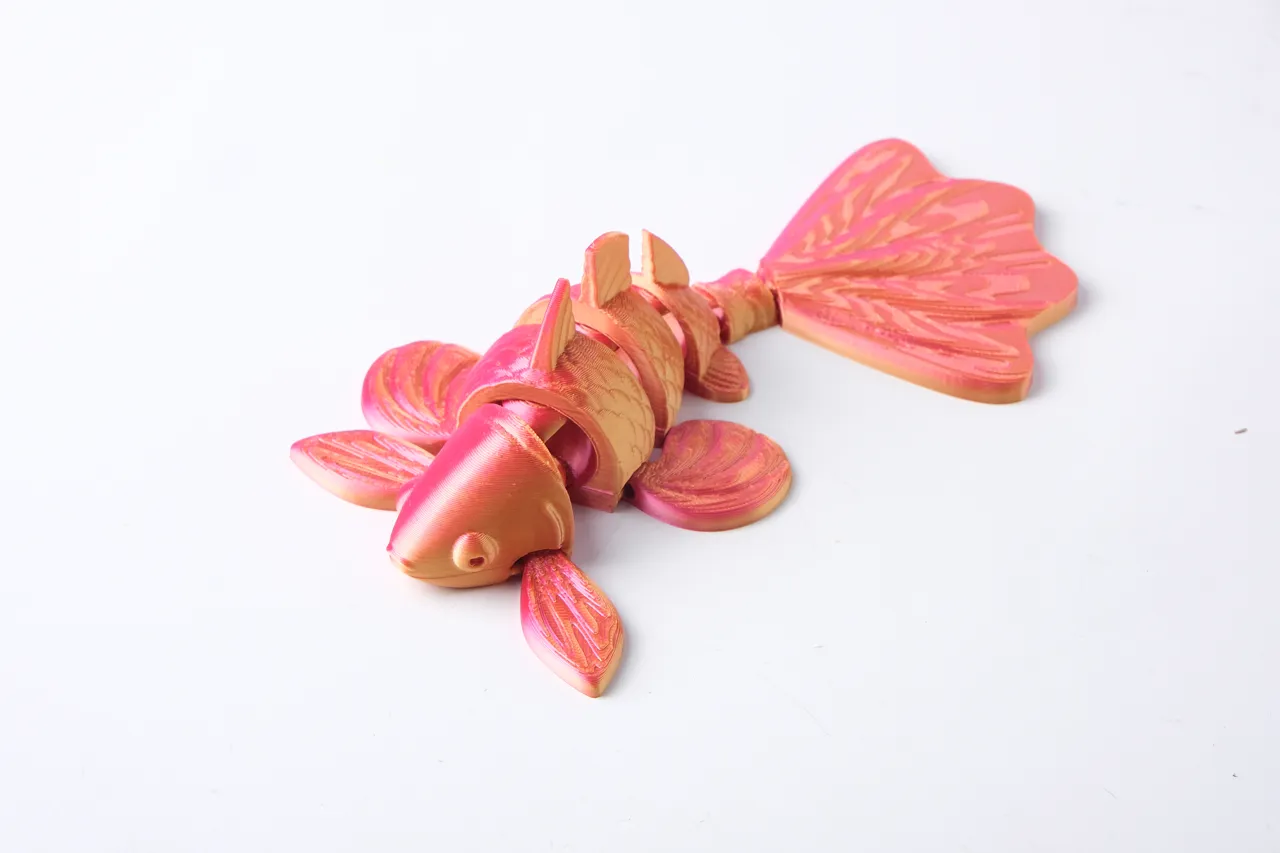 Cute Articulated Goldfish Toy in Red and Gold view 2