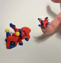 40% scale (little one on finger)