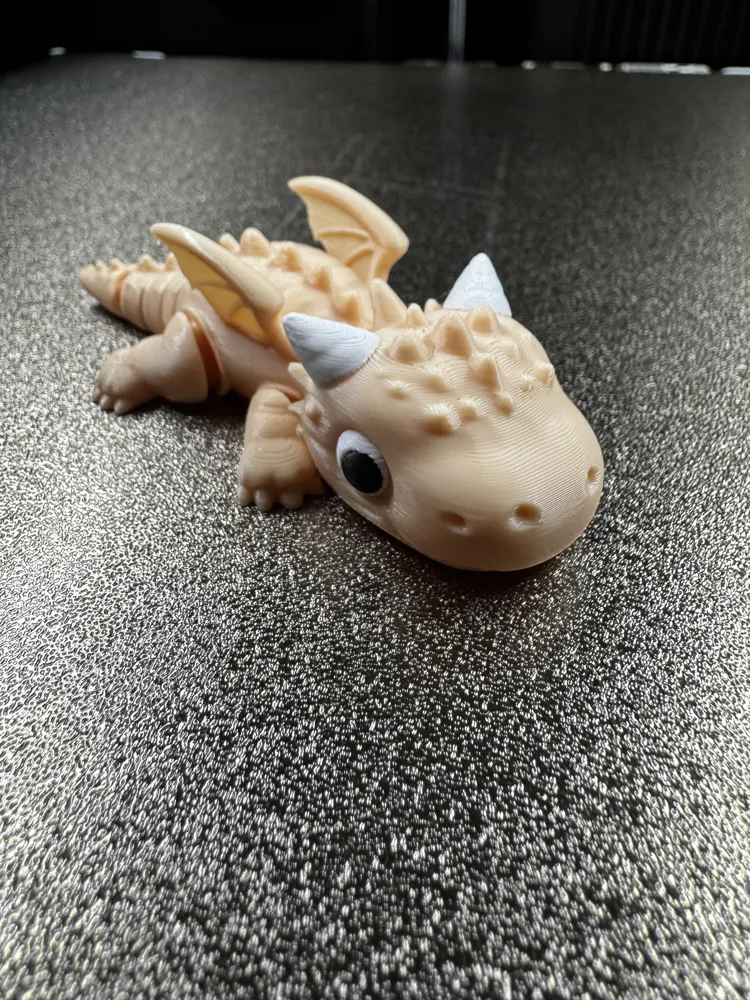 Cute Dragon with Wings - flexible - Free 3D Print Model - MakerWorld