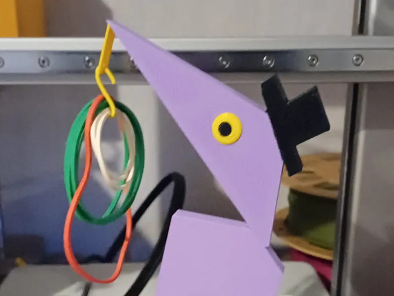 Novelty gimmick key/elastic band holder