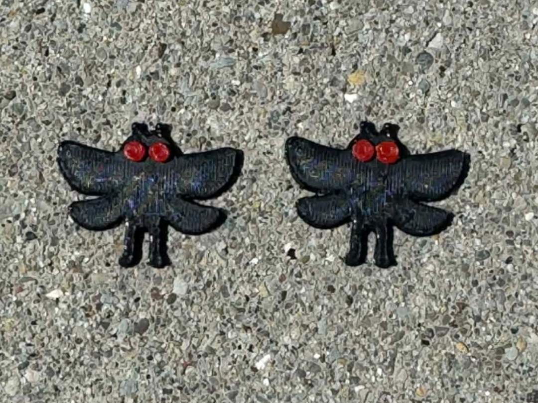 Mothman stud earring