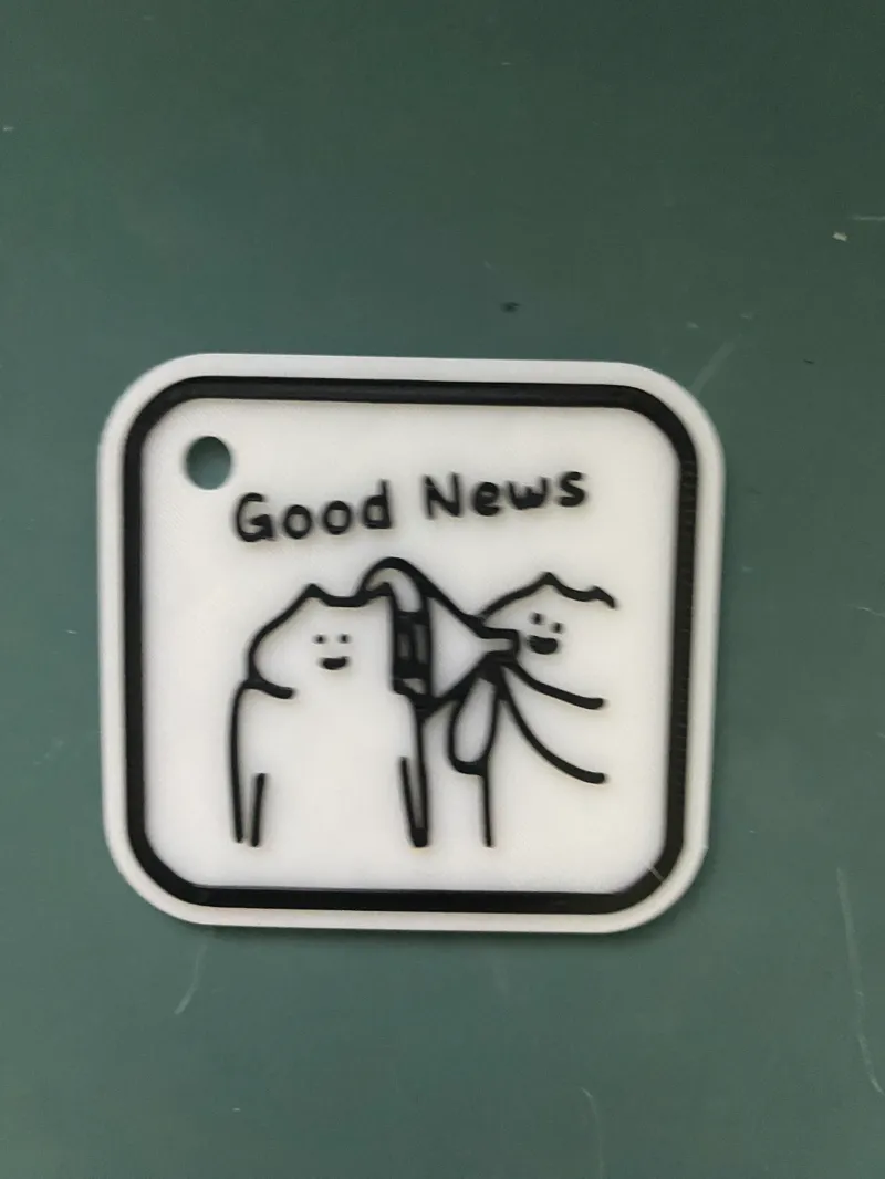 Good News keychain