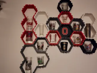Wall mounted hexagon shelves / Shot glass display