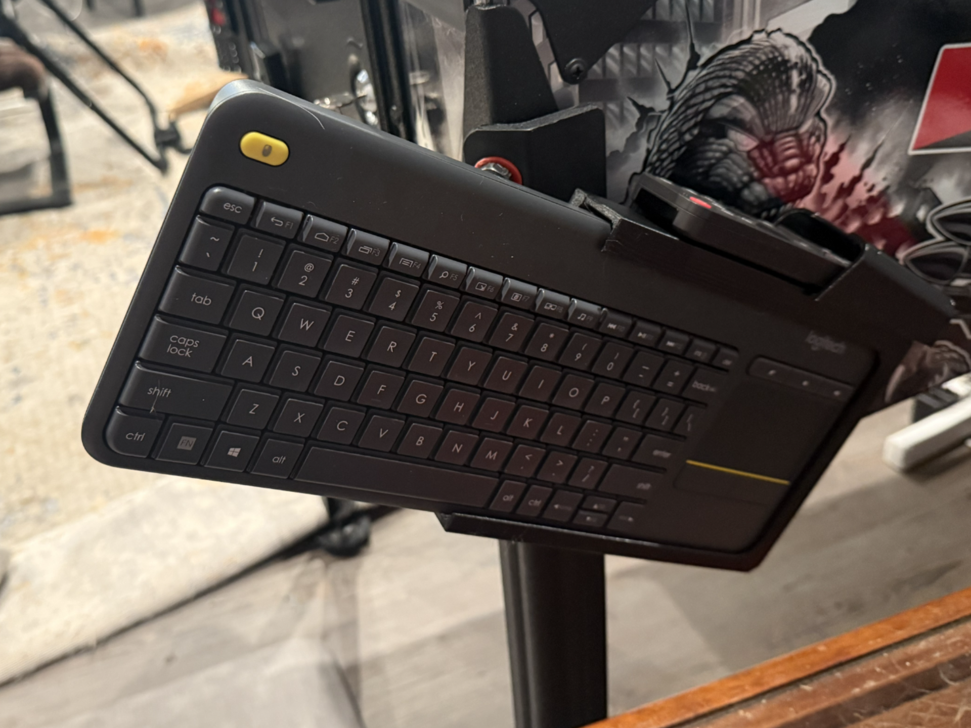 Pinball leg keyboard and remote vertical tray
