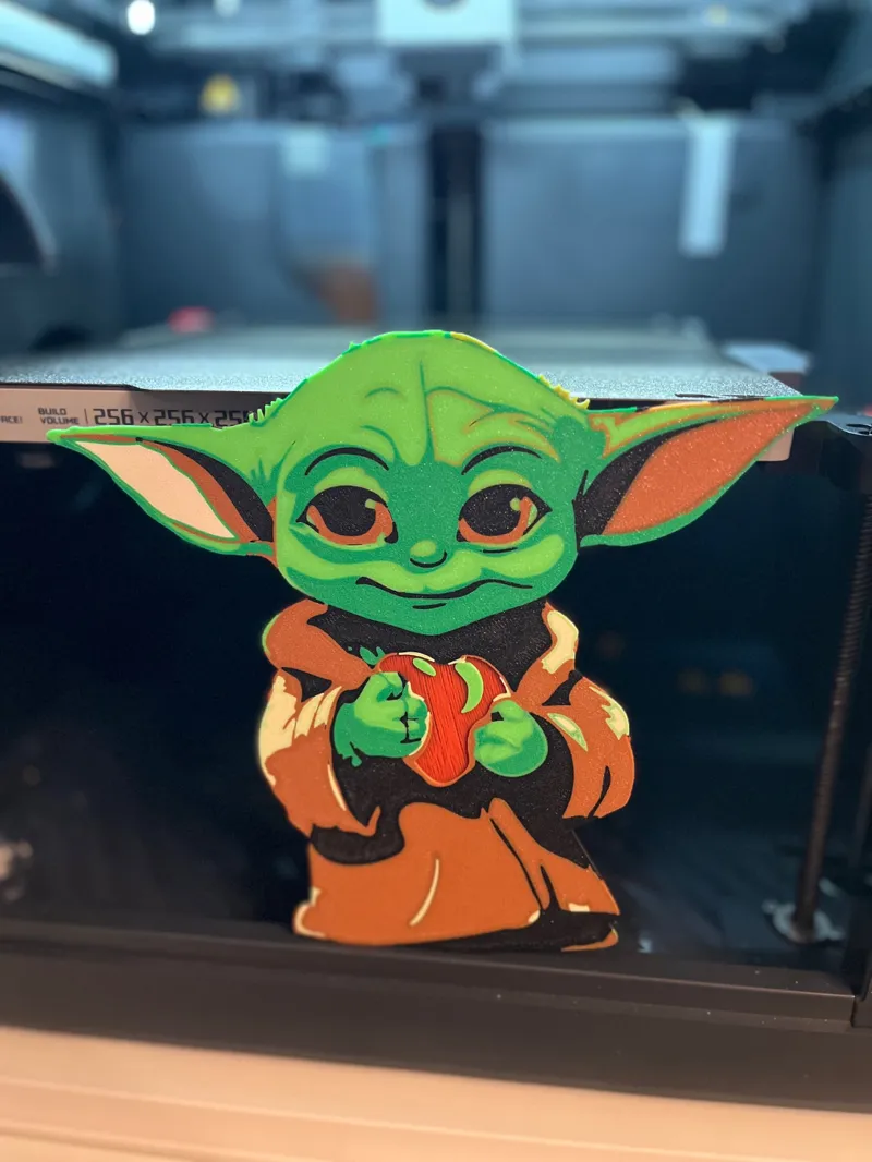 Grogu Baby Yoda holds a valentine heart