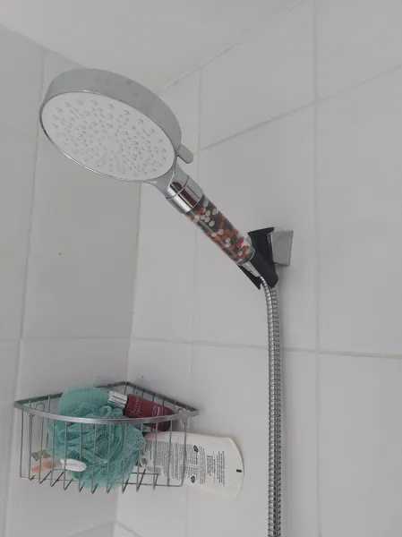 Adaptateur pour pommeau de douche