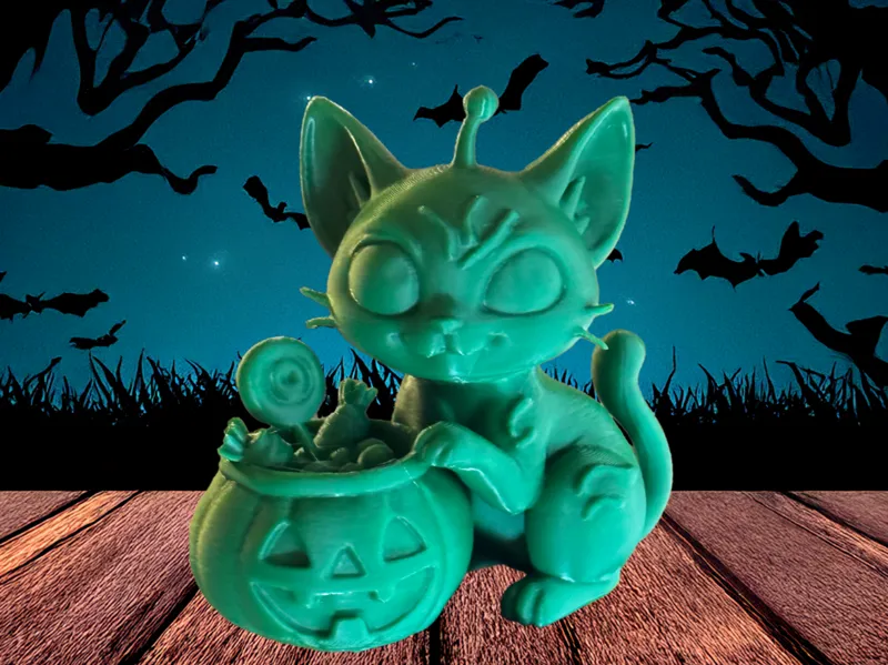 Alien cat enjoys halloween candy