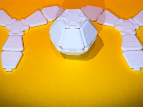 Hexagon gummiband clicker