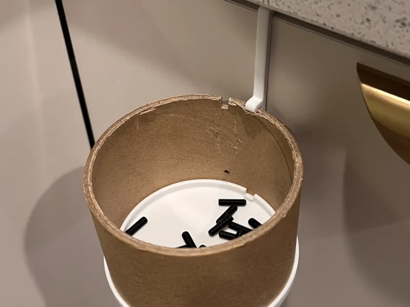 Upcycling carboard spool hanger